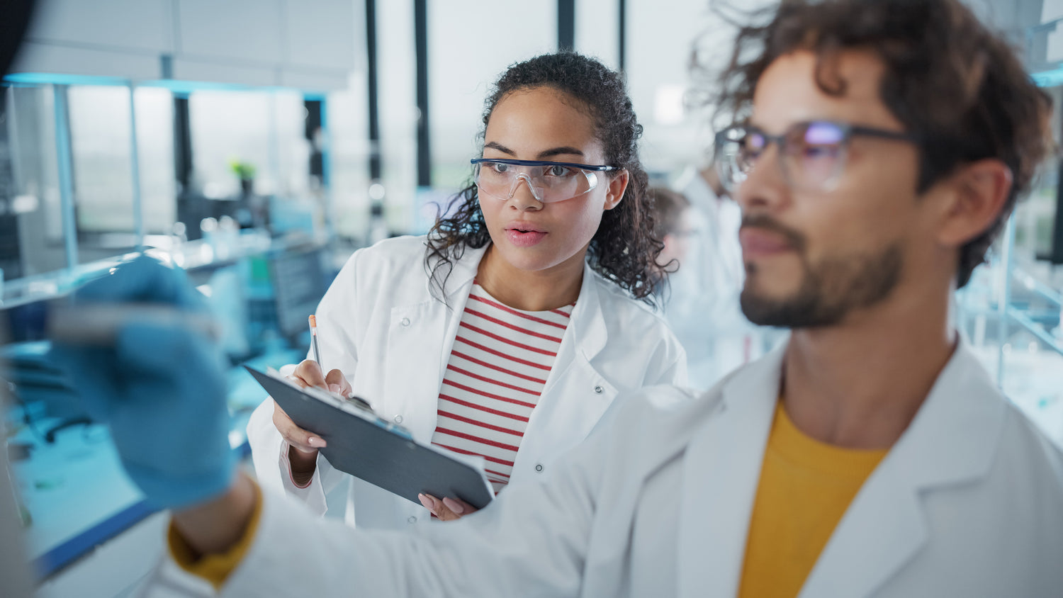 Scientists performing a lab test