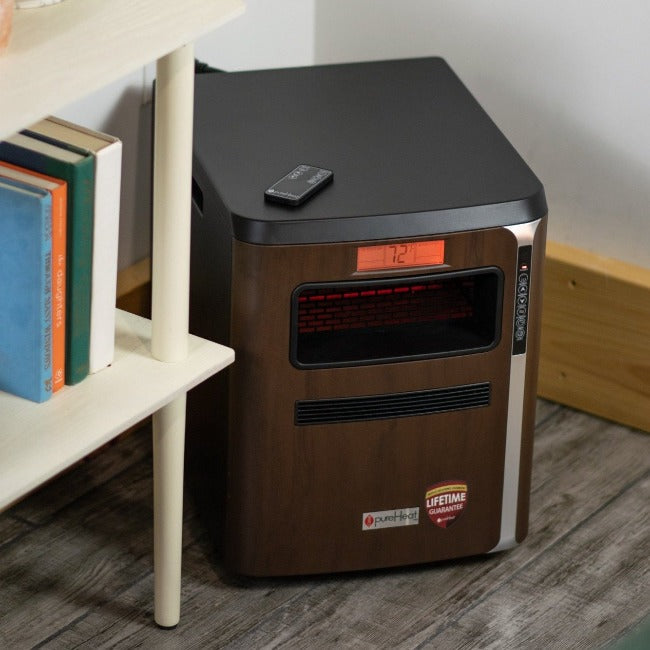 GreenTech Environmental pureHeat 3-in-1 on floor next to table with remote