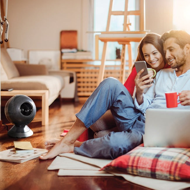 Couple enjoys pureComfort YEAR-ROUND heater and fan