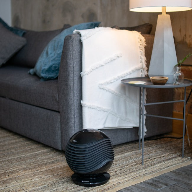 pureHeat WAVE oscillating space heater in living room