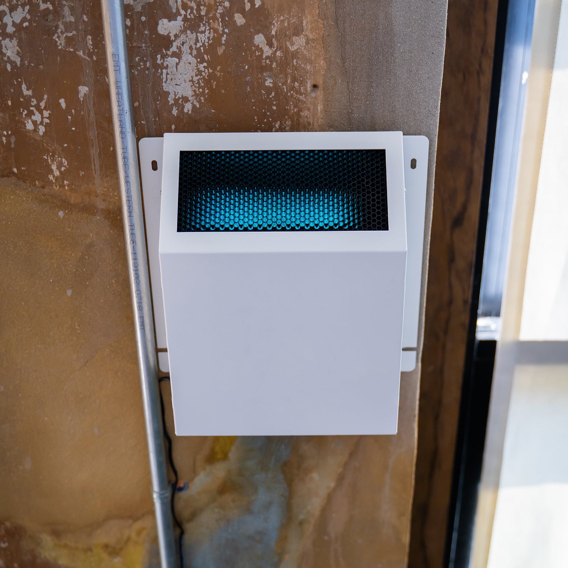 750+ Wall Mount mountable air purifier on a wall